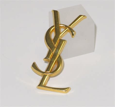 broche yves saint laurent amazon|saint laurent brooch pins.